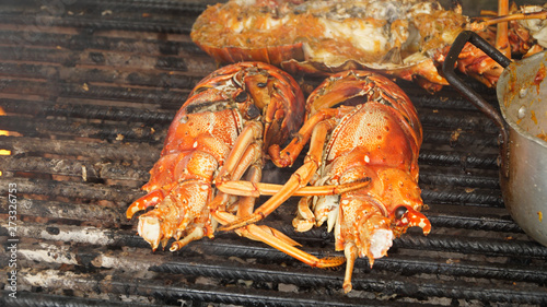 Freshly grilled Lobster on Union Island in the Tobago Cays of Saint Vincent and the Grenadines, Caribbean. photo