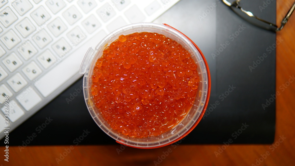 Red caviar in plastic can . Sea food. Healthy eating. Red caviar in plastic can . Sea food. Healthy eating.