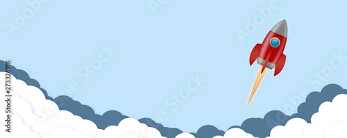 Obraz Koncepcja uruchomienia. Czerwona rakieta na niebieskim tle z chmurami. Koncepcja projektu uruchamiania technologii. Biznes.