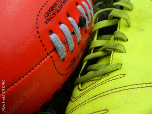 Close up of a football and football boot