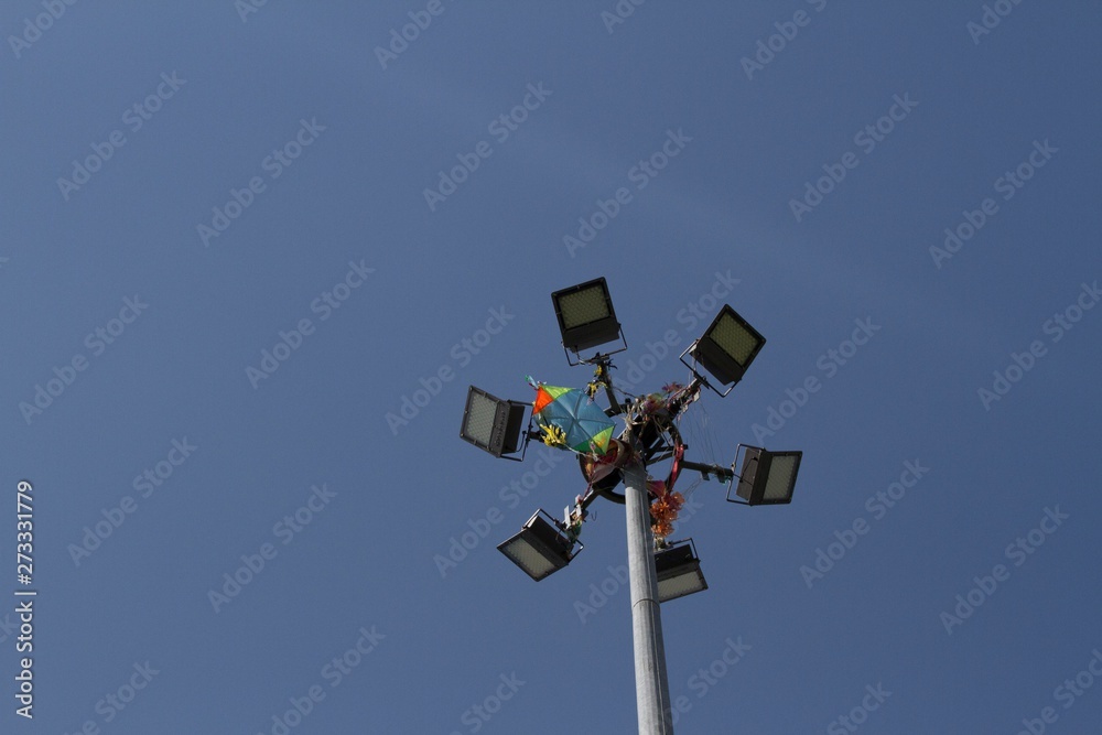 High lighting pole with strong LED lights and a kite attached to it High lighting pole with strong LED lights and a kite attached to it
