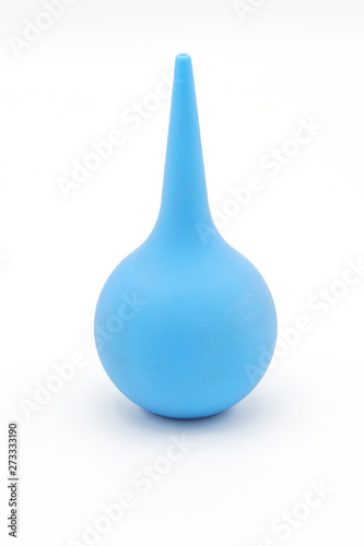 Blue enema on a white background. Medical device for bowel cleansing, the prevention and treatment of constipation