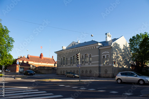 Ancient historic houses on the street in the historic center of Turku in Finland on a summer evening.