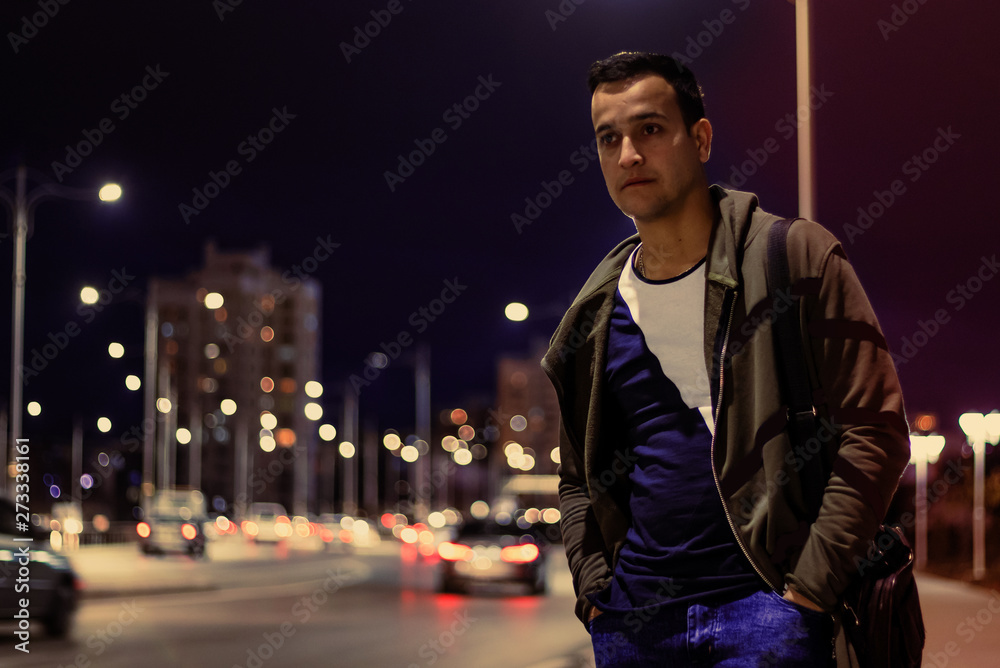 young man in the night city