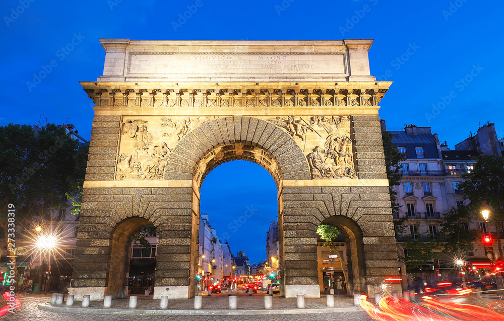 Fototapeta premium Paris, the porte Saint-Martin, beautiful ancient gate near the Grands Boulevards.