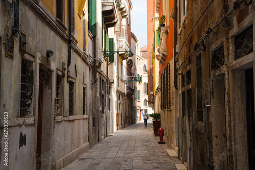 View of the city narrow street in a sunny day in Venice, Italy