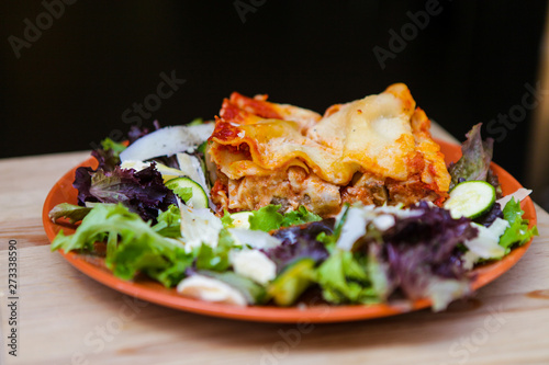 Delicious lasagna with vegetables in the plate 