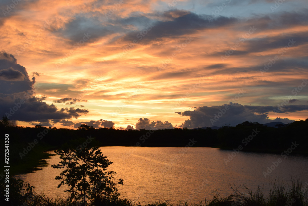 beautiful sunset at the river's edge beautiful sunset at the river's edge