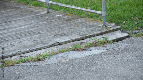 boardwalk planks are a trip hazard and must be repaired