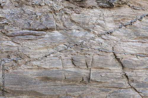 Superfície texturizada de rocha natural, onde se podem ver as linhas desenhadas na rocha longo do tempo. Pode ser usada como papel de parede.