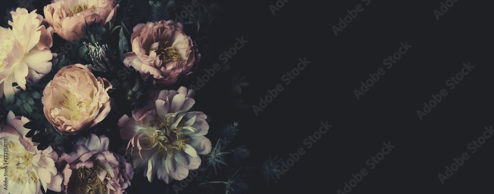 Vintage bouquet of beautiful peonies on black. Floristic decoration. Floral background. Baroque old fashiones style. Natural flowers pattern wallpaper or greeting card