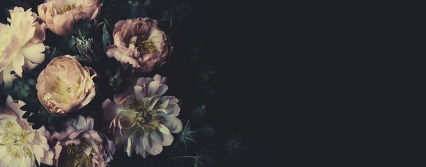 Vintage bouquet of beautiful peonies on black. Floristic decoration. Floral background. Baroque old fashiones style. Natural flowers pattern wallpaper or greeting card