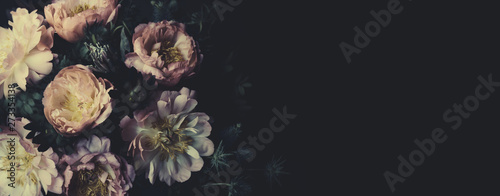 Vintage bouquet of beautiful peonies on black. Floristic decoration. Floral background. Baroque old fashiones style. Natural flowers pattern wallpaper or greeting card