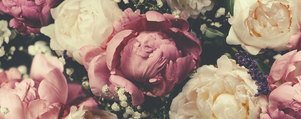 Vintage bouquet of pink and white peonies. Floristic decoration. Floral background. Baroque old fashiones style image. Natural flowers pattern wallpaper or greeting card