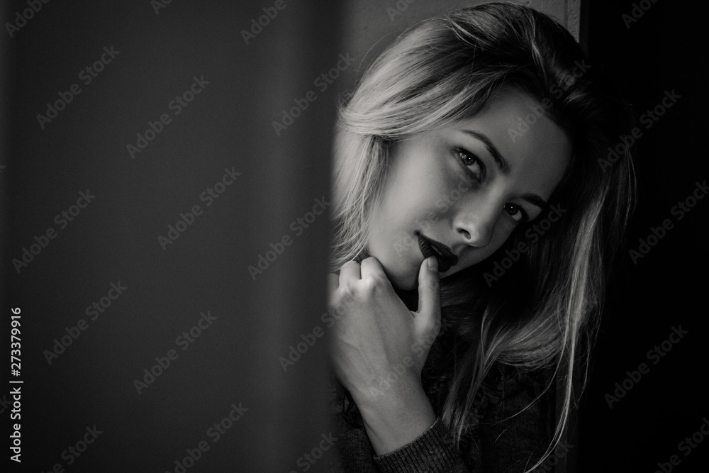 Black and white portrait of young woman