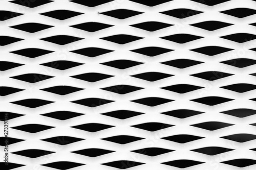 Die Nahaufname eines gestanzten Wellbleches und Streckmetalls...