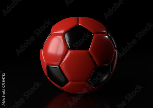 Classic red black soccer ball isolated on black background. 3d render illustration