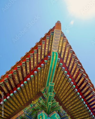 Corner of roof of Chinese building: painted in bright colours