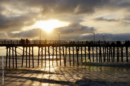 The ocean view  pier bridge playground and sunset