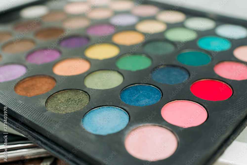 Makeup eyeshadow palette. Multicolored palette of shadows. Eyeshadow palette with top colors for makeup. Makeup eyeshadow palette. Multicolored palette of shadows. Eyeshadow palette with top colors for makeup.