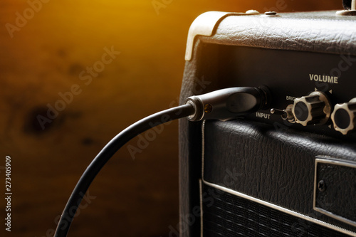 close up of guitar amplifier and  guitar jack, music concept