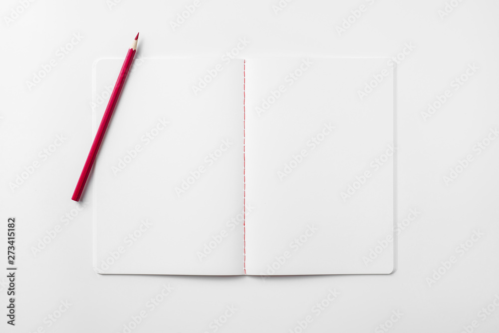 red notebook isolated on white background red notebook isolated on white background