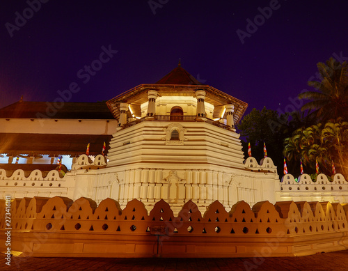 Temple of the Tooth Relic and Reflections Before Dawn in Kandy Sri Lanka. photo