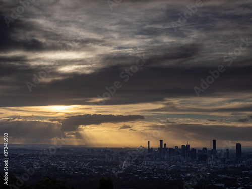 Sunrise Cityscape with Dramatic Sky