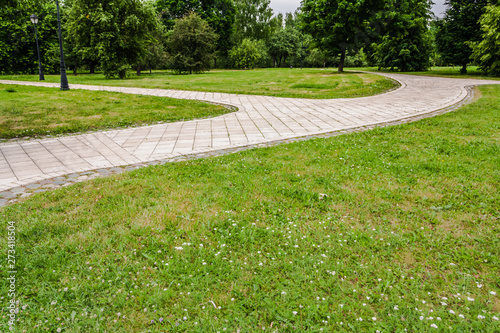 winding road of tile in the park