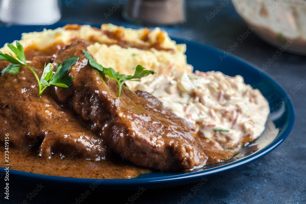 Stewed pork neck with potatoes and sauce Stewed pork neck with potatoes and sauce