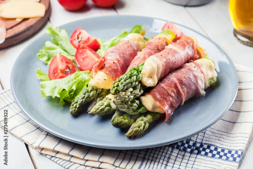 Baked prosciutto and cheese wrapped asparagus Baked prosciutto and cheese wrapped asparagus