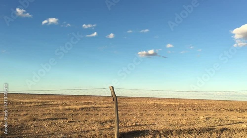 Dingo Fence near Coober Pedy in South Australia Outback.It is one of the longest structures in the world with total Length of 5,614 km. photo