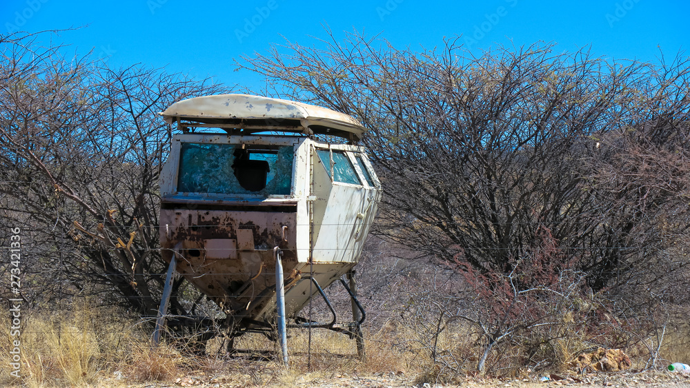Old wrecked military vehicle in desert landscape
