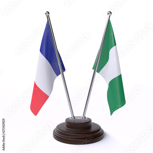 France and Nigeria, two table flags isolated on white background. 3d image