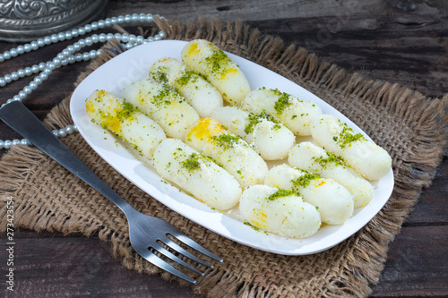 Indian Sweet Food Long Rasgulla photo