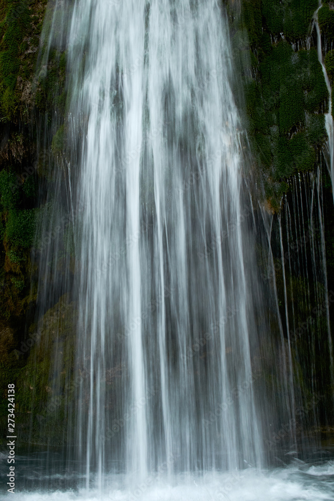 Obraz premium River Abasha Waterfall Natural Monument.Falling waterfall.Photographed in Georgia for a long time.