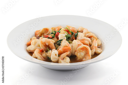 stir-fried shrimps and basil isolated on white background