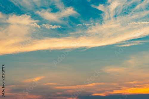 Fototapeta Naklejka Na Ścianę i Meble -  Dramatic blue and orange sky and clouds abstract background. Red-orange clouds on sunset sky. Warm weather background. Art picture of sky at dusk. Sunset abstract background. Dusk and dawn concept