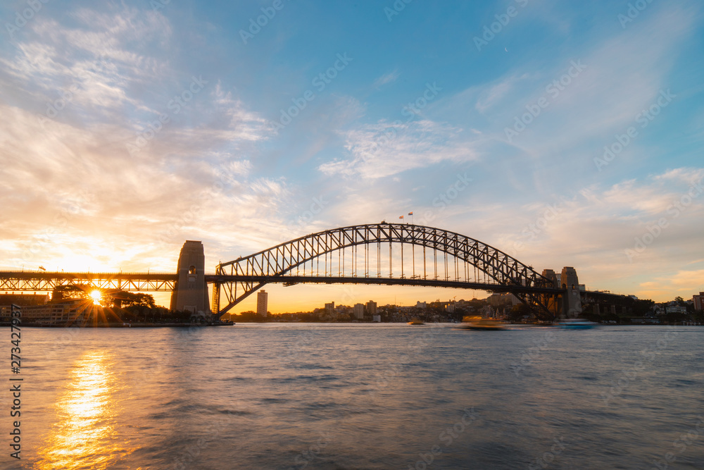 Beautiful sunset sky view of Sydney Harbour Bridge.