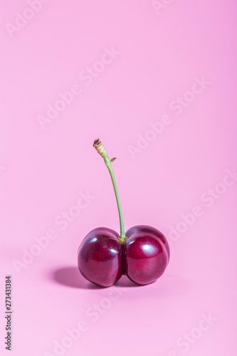 Cherries on a pink background