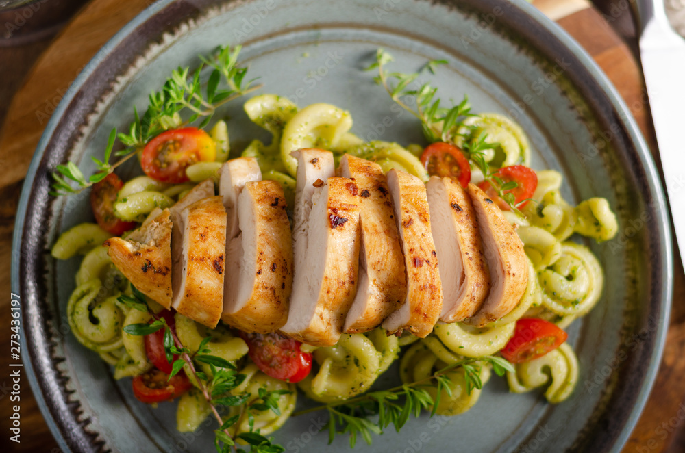Homemade pesto pasta with grilled chicken Homemade pesto pasta with grilled chicken