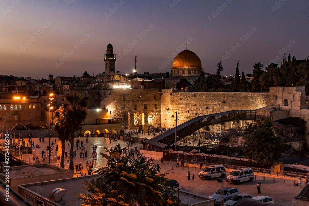 View of the Old City at the Western Wall and Temple Mount in the evening, in Jerusalem, Israel. Night view.