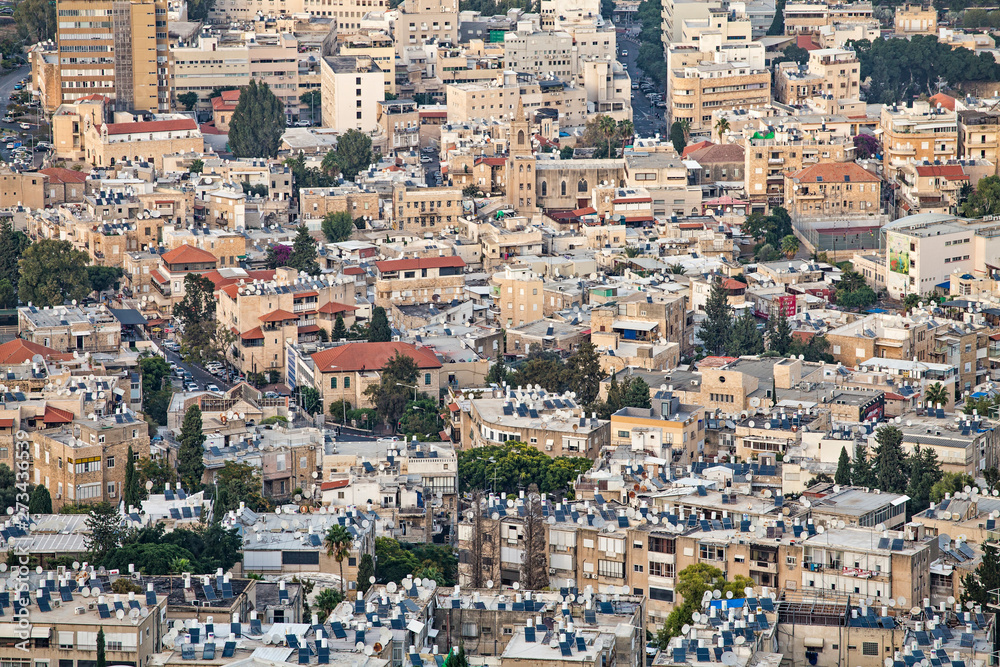 Aerial view of downtown Haifa, Residential area, Northern Israel. Solar panels and roof boilers