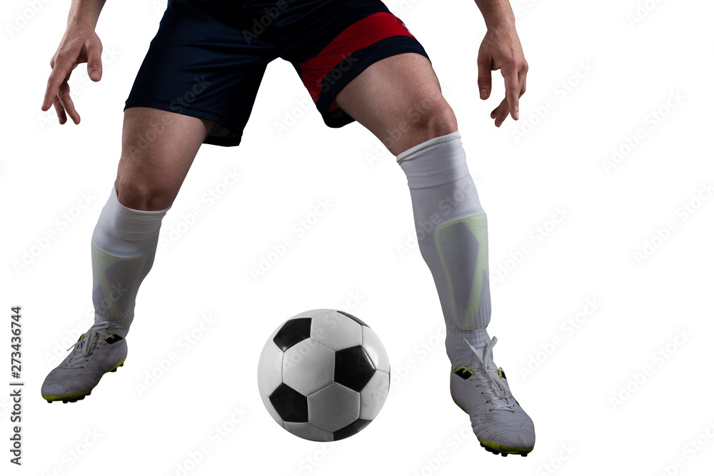 Soccer player ready to kick the soccerball at the stadium during the match. Isolated on white background Soccer player ready to kick the soccerball at the stadium during the match. Isolated on white background