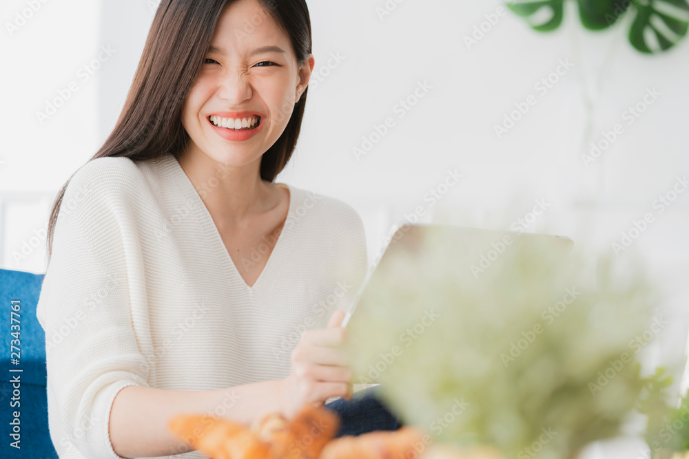 beautiful asian woman communication with friend in happiness mood morning weekend home background