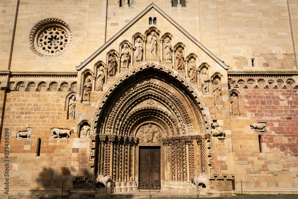 Famous entrance of Romanesque Church interior of Jak in Hungary