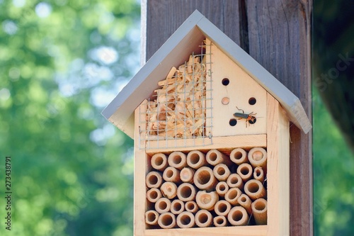 Insect hotel or insect house. Environmental preservation. © Tunatura