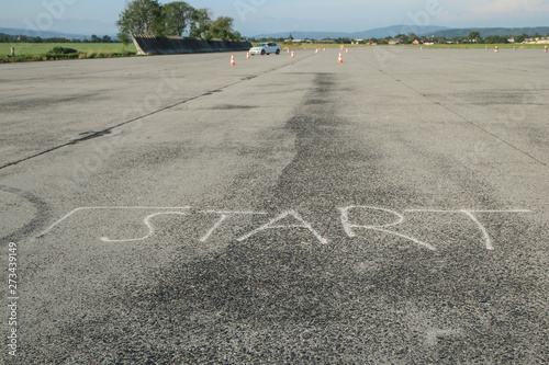 The picture of a provisional starting point to a slalom race on the old airfield. 