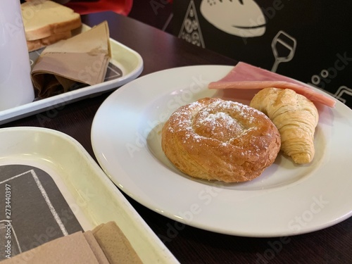 breakfast with cake and croissant