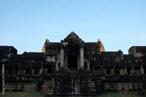 Fragment of an ancient stone temple in Cambodia. The ancient architecture of Southeast Asia. Abandoned temple. photo